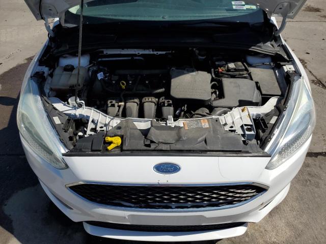 Photo 11 from auction – 2015 FORD FOCUS SE with VIN 1FADP3K21FL277752