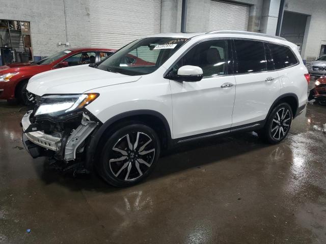 HONDA PILOT TOUR 2020 with VIN 5FNYF6H65LB041372 - Photo from auction