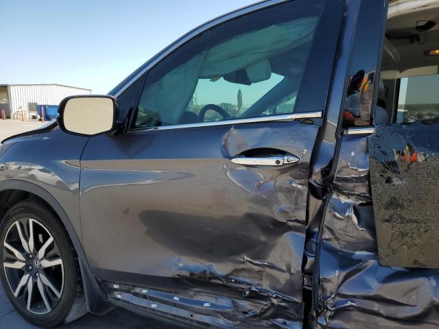 Photo 7 from auction – 2019 HONDA PILOT ELIT with VIN 5FNYF6H02KB028119