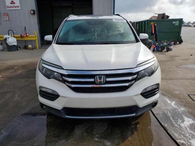 Photo 5 from auction – 2016 HONDA PILOT TOUR with VIN 5FNYF5H92GB002300