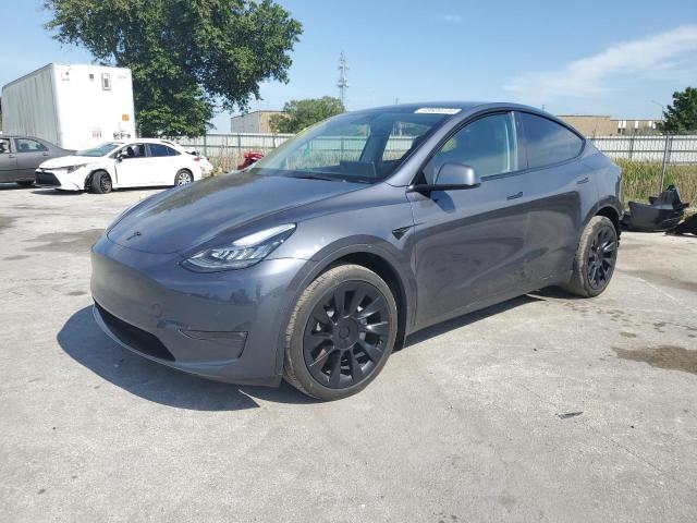 TESLA MODEL Y 2022 with VIN 7SAYGDEE0NF307979 - Photo from auction