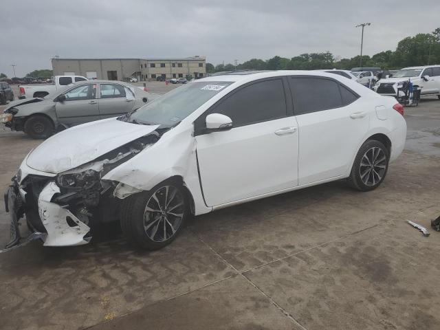TOYOTA COROLLA L 2018 with VIN 5YFBURHE0JP784947 - Photo from auction