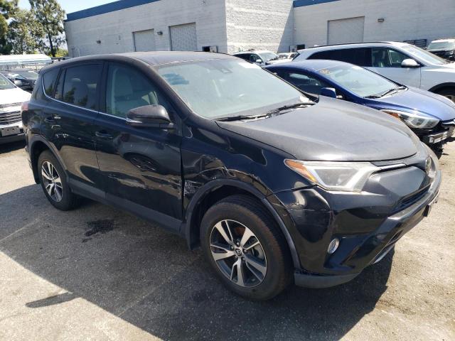 Photo 4 from auction – 2018 TOYOTA RAV-4 with VIN 2T3WFREV0JW466848
