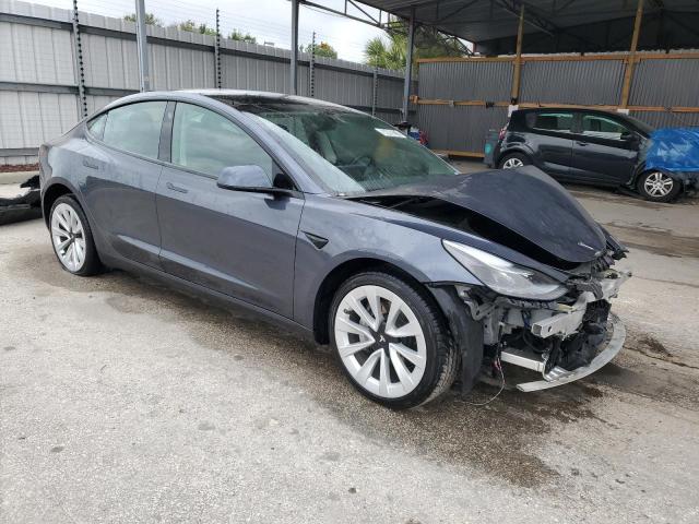 Photo 4 from auction – 2022 TESLA MODEL 3 with VIN 5YJ3E1EAXNF370659