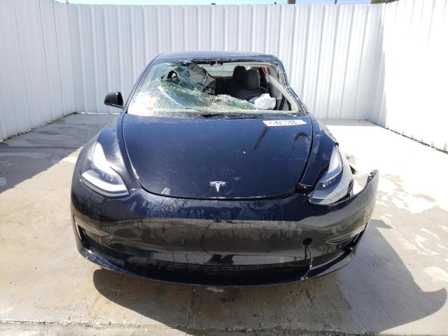 Photo 5 from auction – 2022 TESLA MODEL 3 with VIN 5YJ3E1EA4NF185281