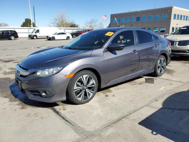 Photo 1 from auction – 2018 HONDA CIVIC EX with VIN 19XFC1E37JE003643