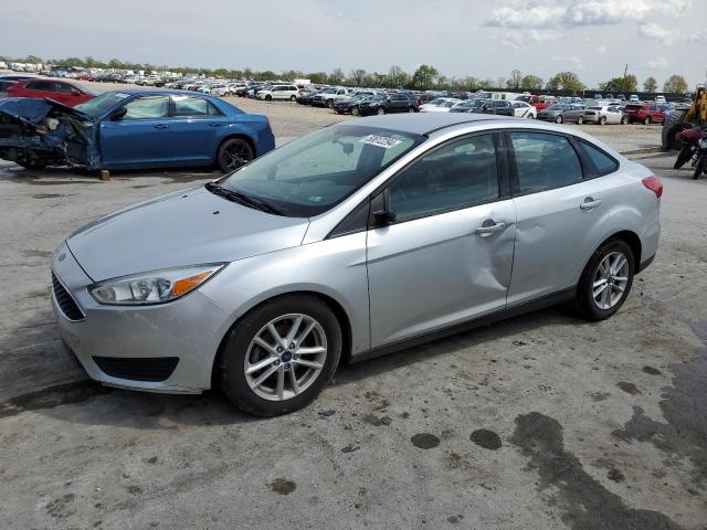 FORD FOCUS SE 2016 with VIN 1FADP3F2XGL310890 - Photo from auction