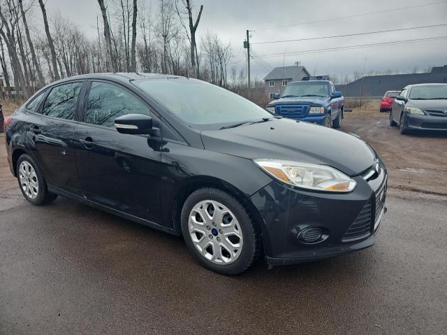 FORD FOCUS SE 2014 with VIN 1FADP3F29EL343201 - Photo from auction