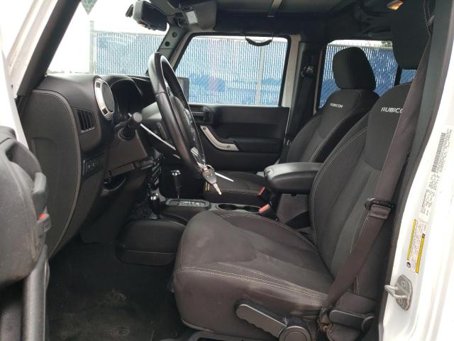 Photo 7 from auction – 2014 JEEP WRANGLER U with VIN 1C4BJWFG0EL290954