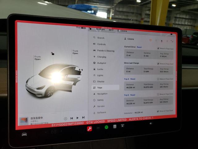 Photo 9 from auction – 2021 TESLA MODEL Y with VIN 5YJYGDED1MF133990