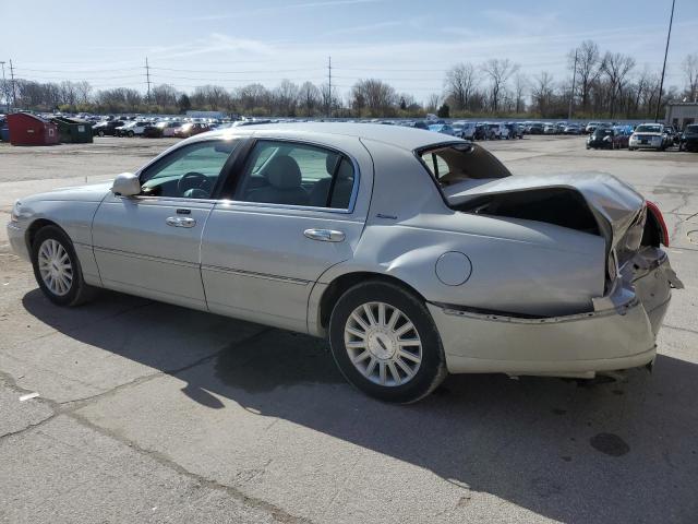 Photo 2 from auction – 2004 LINCOLN TOWN CAR E with VIN 1LNHM81W94Y648223