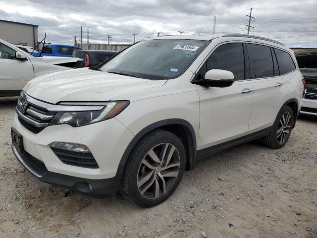 HONDA PILOT TOUR 2017 with VIN 5FNYF5H96HB046334 - Photo from auction