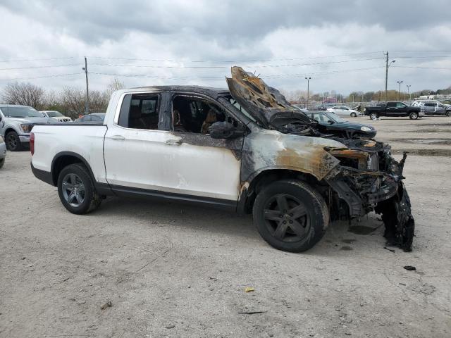 Photo 4 from auction – 2023 HONDA RIDGELINE with VIN 5FPYK3F53PB035393