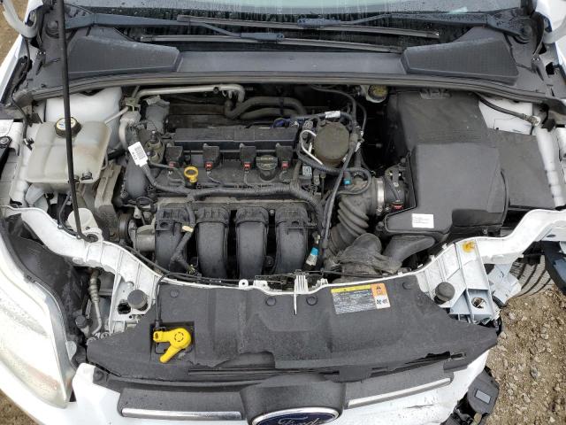 Photo 11 from auction – 2014 FORD FOCUS SE with VIN 1FADP3F21EL210240