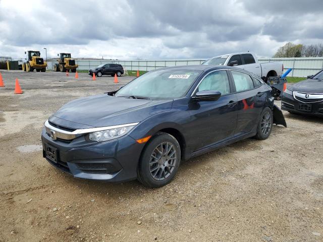 HONDA CIVIC LX 2018 with VIN 19XFC2F57JE014633 - Photo from auction