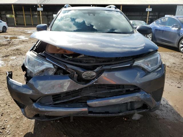 Photo 5 from auction – 2017 TOYOTA RAV4 LE with VIN JTMZFREV5HJ704568
