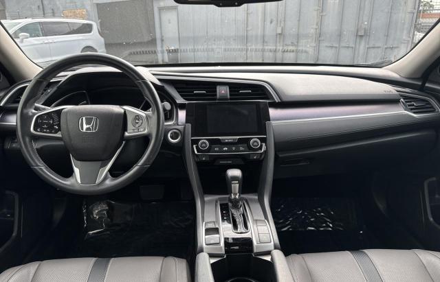 Photo 9 from auction – 2018 HONDA CIVIC EX with VIN JHMFC1F81JX034198