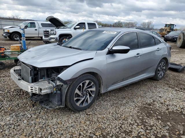 HONDA CIVIC EX 2018 with VIN 19XFC2F79JE019074 - Photo from auction
