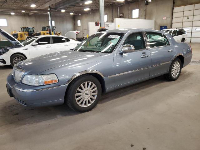 LINCOLN TOWN CAR E 2004 with VIN 1LNHM81W94Y638937 - Photo from auction