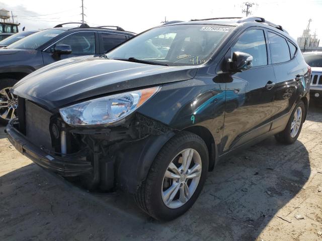 HYUNDAI TUCSON GLS 2012 with VIN KM8JUCAC0CU403388 - Photo from auction