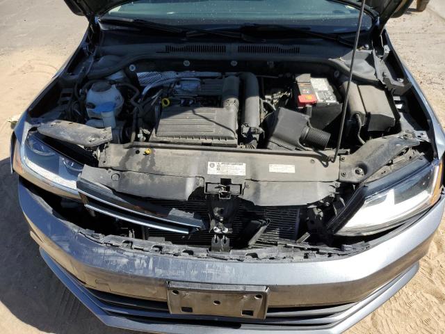 Photo 11 from auction – 2018 VOLKSWAGEN JETTA S with VIN 3VW2B7AJ0JM260588