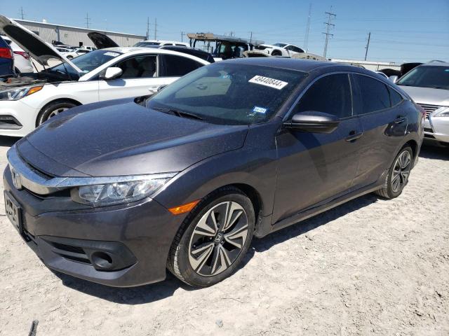 HONDA CIVIC EXL 2018 with VIN JHMFC1F76JX035662 - Photo from auction