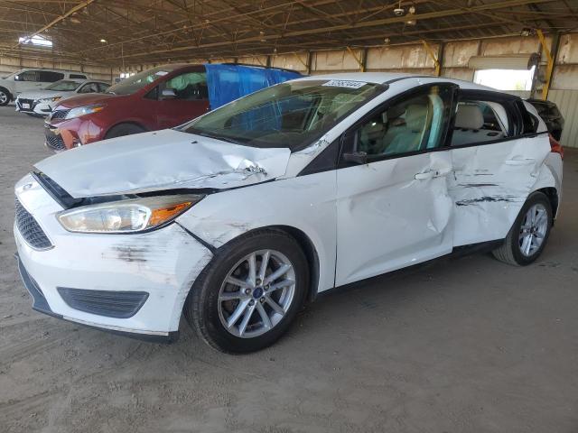 FORD FOCUS SE 2018 with VIN 1FADP3K27JL241895 - Photo from auction