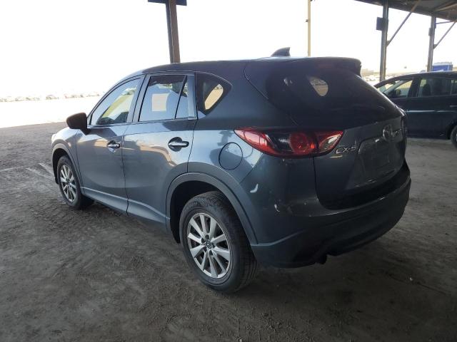Photo 2 from auction – 2013 MAZDA CX-5 SPORT with VIN JM3KE2BE0D0144630