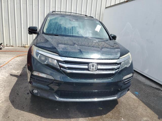 Photo 5 from auction – 2017 HONDA PILOT TOUR with VIN 5FNYF6H93HB031358