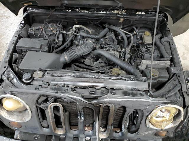 Photo 11 from auction – 2007 JEEP WRANGLER S with VIN 1J8GA59147L216682