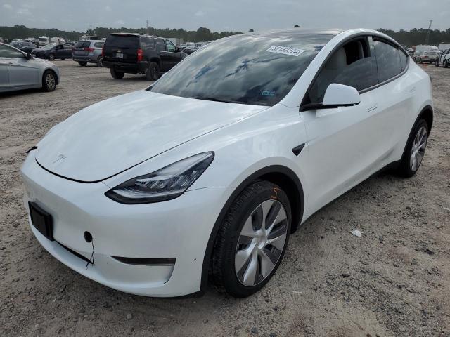 TESLA MODEL Y 2023 with VIN 7SAYGDEE0PA080275 - Photo from auction