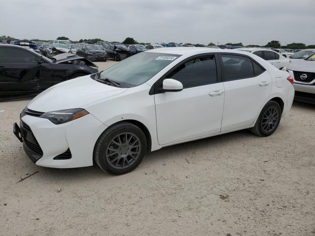 TOYOTA COROLLA L 2019 with VIN 5YFBURHE7KP864635 - Photo from auction