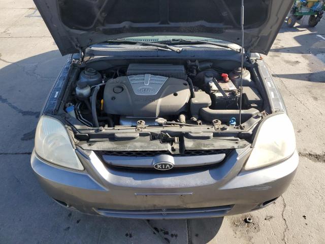 Photo 11 from auction – 2003 KIA RIO CINCO with VIN KNADC165036147905