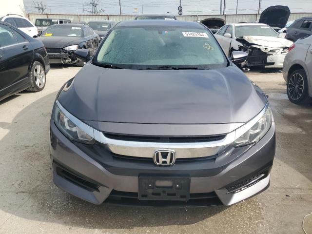 Photo 5 from auction – 2017 HONDA CIVIC LX with VIN 19XFC2F51HE040977