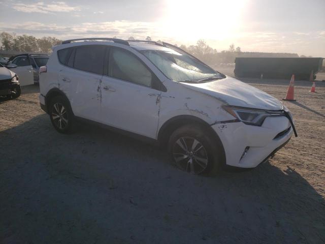 Photo 4 from auction – 2017 TOYOTA RAV4 XLE with VIN JTMWFREV1HD104874