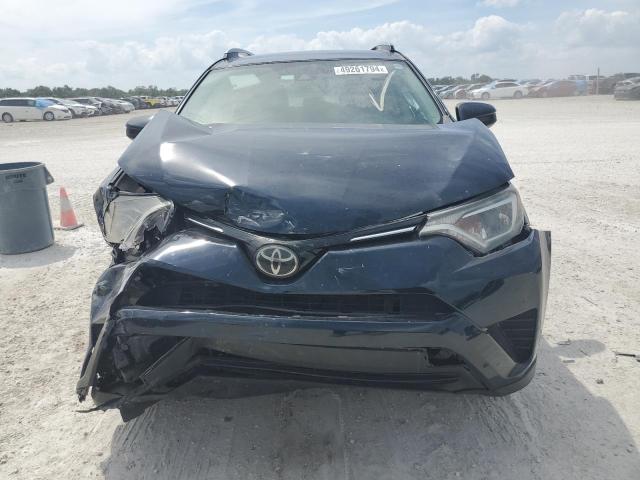 Photo 5 from auction – 2018 TOYOTA RAV4 LE with VIN 2T3ZFREV8JW470059