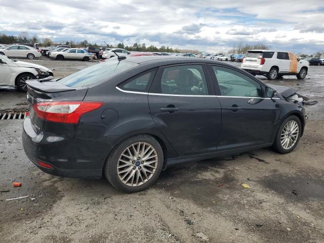 Photo 3 from auction – 2014 FORD FOCUS TITA with VIN 1FADP3J2XEL101802