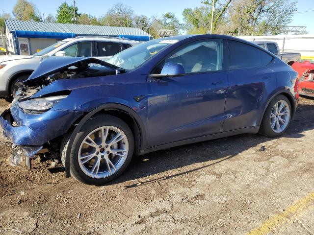 TESLA MODEL Y 2023 with VIN 7SAYGAEE6PF966635 - Photo from auction