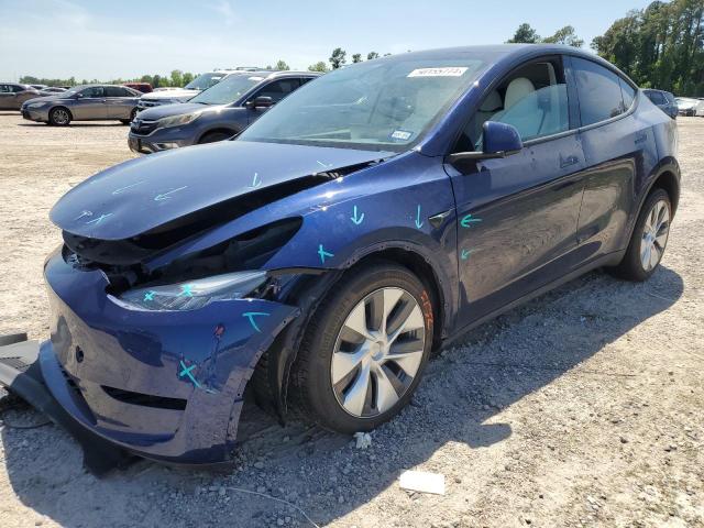 TESLA MODEL Y 2023 with VIN 7SAYGDEE5PA095239 - Photo from auction