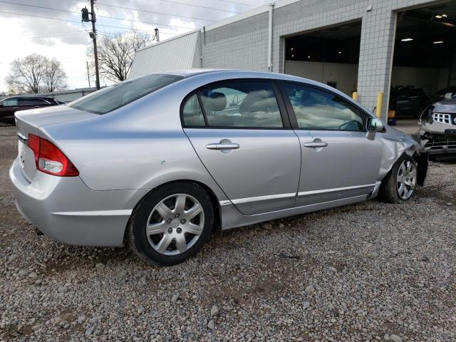 Photo 3 from auction – 2011 HONDA CIVIC LX with VIN 19XFA1F50BE021408