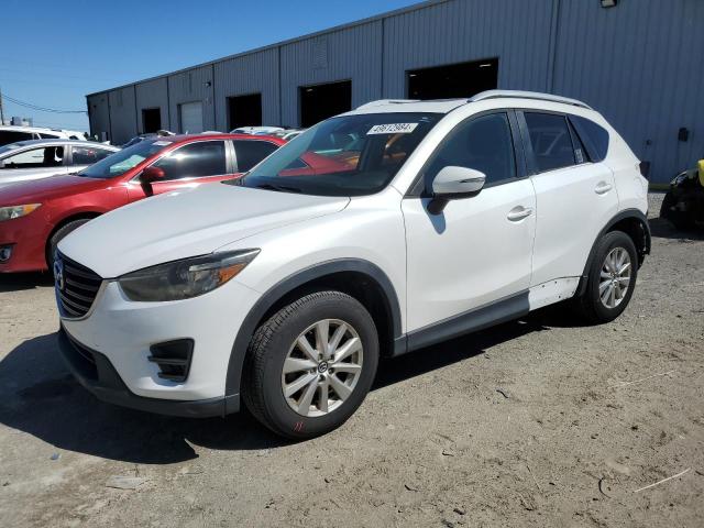 MAZDA CX-5 TOURI 2016 with VIN JM3KE2CY9G0744902 - Photo from auction