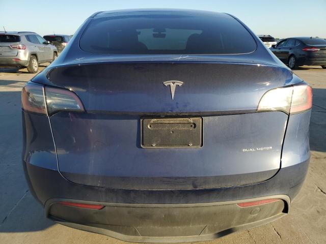 Photo 6 from auction – 2023 TESLA MODEL Y with VIN 7SAYGAEE4PF704032