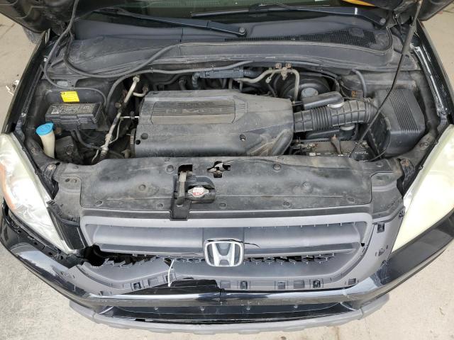 Photo 12 from auction – 2004 HONDA PILOT EX with VIN 2HKYF18494H521354