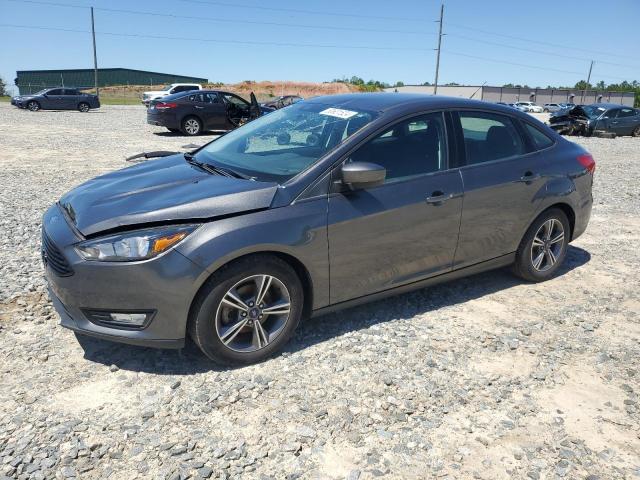 FORD FOCUS SE 2018 with VIN 1FADP3FEXJL219264 - Photo from auction