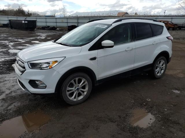 FORD ESCAPE SE 2018 with VIN 1FMCU0GD4JUA11471 - Photo from auction