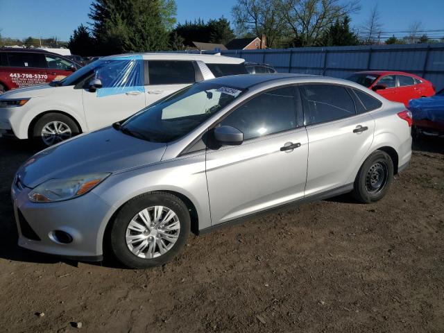 FORD FOCUS S 2012 with VIN 1FAHP3E28CL307600 - Photo from auction