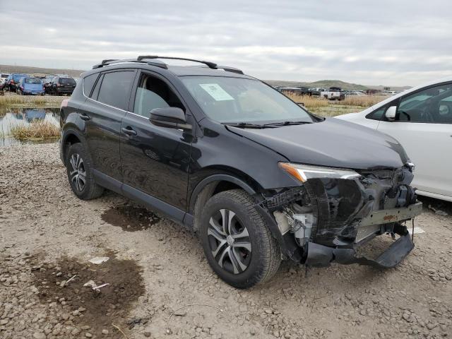Photo 4 from auction – 2018 TOYOTA RAV4 LE with VIN 2T3BFREV3JW763501
