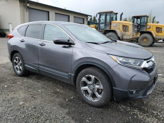 Photo 4 from auction – 2019 HONDA CR-V with VIN JHLRW2H89KX014181