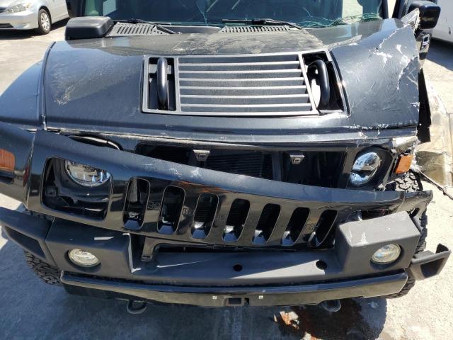 Photo 11 from auction – 2003 HUMMER H2 with VIN 5GRGN23U73H122529