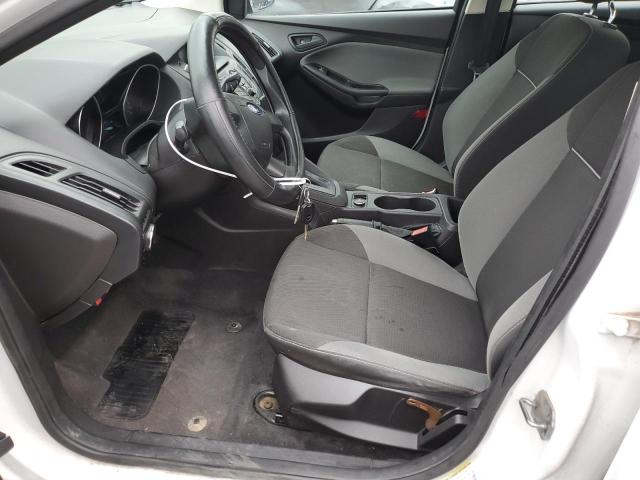 Photo 7 from auction – 2012 FORD FOCUS S with VIN 1FAHP3E26CL450724